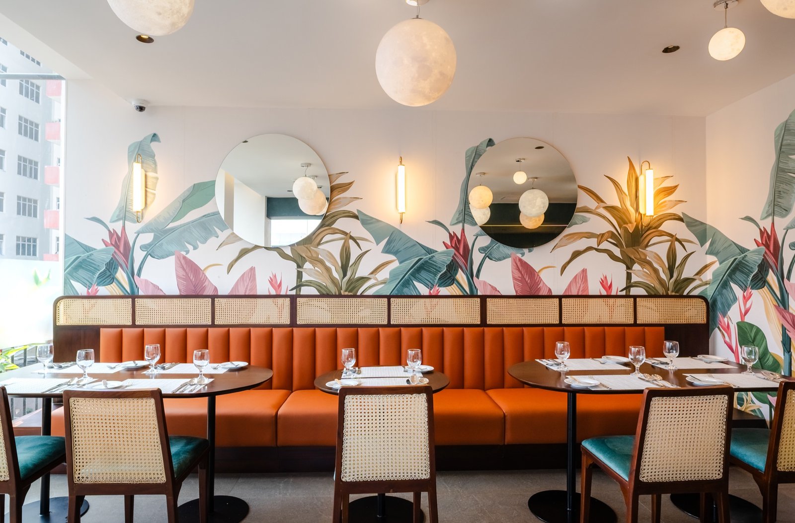 Tropikana dining room with warm banquette seating